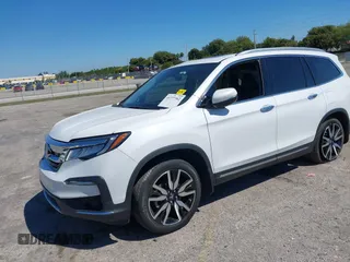 2022 Honda Pilot Touring 7-Passenger с VIN 5FNYF5H66NB034248, выставлен на аукционе IAAI как лот 41777362 с пробегом 26 611 миль миль и . История ставок и продаж доступна на DreamBid. Изображение 16.