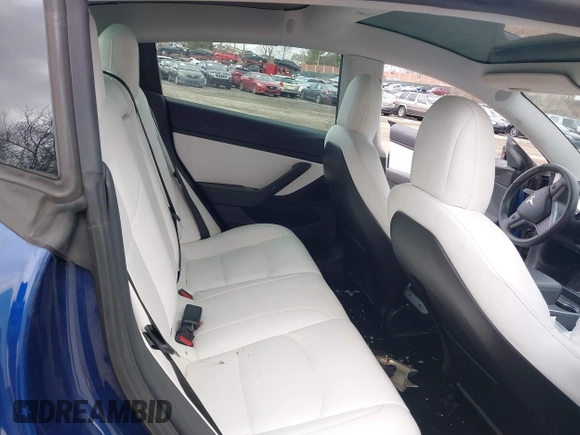 2020 Tesla Model 3 Long Range with VIN 5YJ3E1EB9LF601198, listed as a IAAI auction lot 41744287 with 70,322 mi miles and . Bid and sale history available at DreamBid. Image 8.