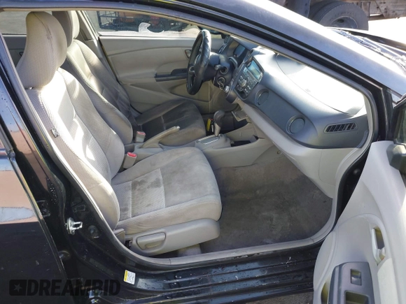 2010 Honda Insight LX with VIN JHMZE2H59AS006887, listed as a IAAI auction lot 41159288 with 263,497 mi miles and . Bid and sale history available at DreamBid. Image 5.
