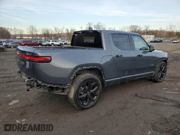 2023 Rivian R1T Adventure z VIN 7FCTGBAA8PN028065, wystawiony jako Copart lot #81941474 z przebiegiem 16 060 mil mil oraz Szkoda całkowita • Salvage title. Historia ofert i sprzedaży dostępna na DreamBid. Obrazek 3.