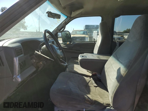 2000 Ford F-350 with VIN 1FTWW32S9YED99031, listed as a Copart auction lot 75952254 with 220,673 mi miles and Salvage title. Bid and sale history available at DreamBid. Image 7.