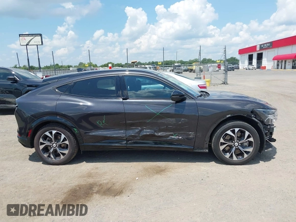 2022 Ford Mustang Mach-E Premium с VIN 3FMTK3R74NMA19756, выставлен на аукционе IAAI как лот 42567927 с пробегом 25 004 миль миль и . История ставок и продаж доступна на DreamBid. Изображение 14.