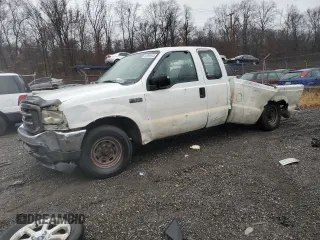 2003 Ford Super Duty F-250 XL with VIN 1FTNX20LX3EA88876, listed as a Copart auction lot 82999944 with 0 mi miles and Salvage Title. Bid and sale history available at carsss.com. Image 1.