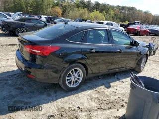 2015 Ford Focus SE with VIN 1FADP3F26FL228606, listed as a Copart auction lot 52525445 with 37,477 mi miles and Salvage Title. Bid and sale history available at DreamBid. Image 3.