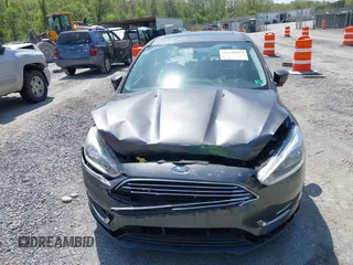 2018 Ford Focus Titanium с VIN 1FADP3J22JL314642, выставлен на аукционе IAAI как лот 42128194 с пробегом 62 787 миль миль и . История ставок и продаж доступна на DreamBid. Изображение 6.