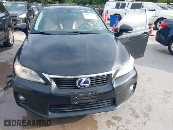 2013 Lexus CT 200h z VIN JTHKD5BH2D2159091, wystawiony jako IAAI lot #42695594 z przebiegiem 218 009 mil mil oraz . Historia ofert i sprzedaży dostępna na DreamBid. Obrazek 6.