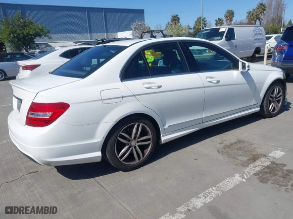 2014 Mercedes-Benz C-Class C 250 Sport with VIN WDDGF4HB8EA930990, listed as a IAAI auction lot 41931264 with 129,234 mi miles. Bid and sale history available at carsss.com. Image 4.