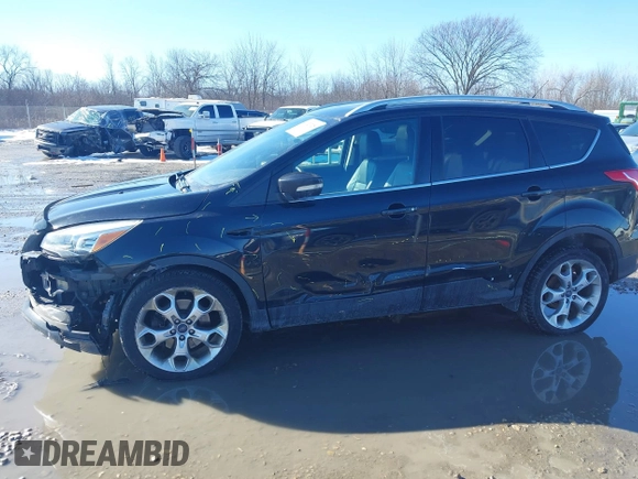2015 Ford Escape Titanium with VIN 1FMCU9J91FUC68152, listed as a IAAI auction lot 41620725 with 195,122 mi miles. Bid and sale history available at carsss.com. Image 14.
