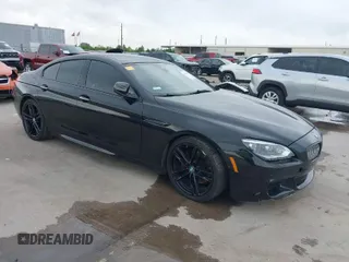 2014 BMW 6 Series 650i with VIN WBA6B2C55ED129419, listed as a IAAI auction lot 39061341 with 68,790 mi miles and . Bid and sale history available at carsss.com. Image 1.