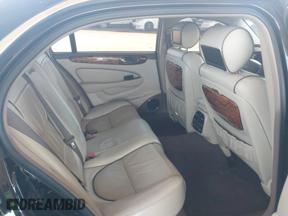 2005 Jaguar XJ Vanden Plas z VIN SAJWA82C05SG47589, wystawiony jako IAAI lot #42409697 z przebiegiem 222 598 mil mil oraz . Historia ofert i sprzedaży dostępna na DreamBid. Obrazek 8.