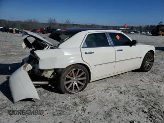 2006 Chrysler 300 C with VIN 2C3KA63H56H477106, listed as a Copart auction lot 48004705 with 174,593 mi miles and Salvage Title. Bid and sale history available at carsss.com. Image 3.