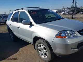 2001 Acura MDX Touring Pkg with VIN 2HNYD18841H543804, listed as a IAAI auction lot 41632129 with 166,718 mi miles. Bid and sale history available at carsss.com. Image 1.