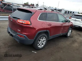 2014 Jeep Cherokee Altitude with VIN 1C4PJMCSXEW124863, listed as a Copart auction lot 82432534 with 194,559 mi miles and Salvage Title. Bid and sale history available at carsss.com. Image 3.