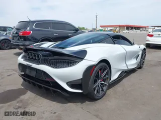 2021 McLaren 765LT with VIN SBM14RCA3MW765344, listed as a IAAI auction lot 40934179 with 10,900 mi miles. Bid and sale history available at carsss.com. Image 4.