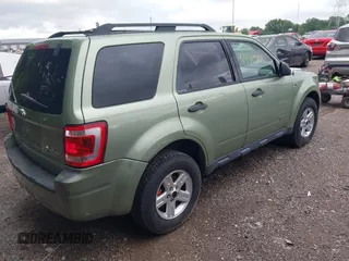 2008 Ford Escape Hybrid with VIN 1FMCU59H88KC30923, listed as a IAAI auction lot 42440706 with 98,635 mi miles and . Bid and sale history available at DreamBid. Image 4.