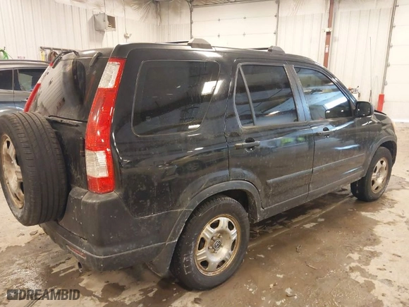 2005 Honda CR-V LX with VIN JHLRD78525C051447, listed as a IAAI auction lot 41554653 with 162,706 mi miles. Bid and sale history available at carsss.com. Image 4.