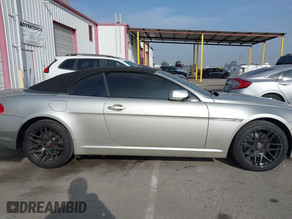 2006 BMW 6 Series 650Ci z VIN WBAEK13486CN72278, wystawiony jako IAAI lot #41119321 z przebiegiem 170 553 mil mil oraz . Historia ofert i sprzedaży dostępna na DreamBid. Obrazek 13.