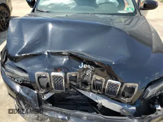 2019 Jeep Cherokee Latitude Plus with VIN 1C4PJMLBXKD233718, listed as a Copart auction lot 58933435 with 56,413 mi miles and Salvage title. Bid and sale history available at DreamBid. Image 12.