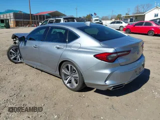 2021 Acura TLX w/Advance Package with VIN 19UUB5F68MA007218, listed as a IAAI auction lot 41693746 with 14,965 mi miles. Bid and sale history available at carsss.com. Image 3.