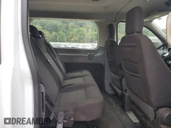 2019 Ford Transit Passenger XL with VIN 1FBZX2ZM2KKB05753, listed as a Copart auction lot 67327814 with 112,202 mi miles and Salvage Title. Bid and sale history available at DreamBid. Image 12.