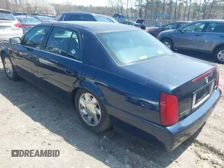 2002 Cadillac DeVille DTS with VIN 1G6KF57912U205527, listed as a IAAI auction lot 42064174 with 135,002 mi miles. Bid and sale history available at carsss.com. Image 3.