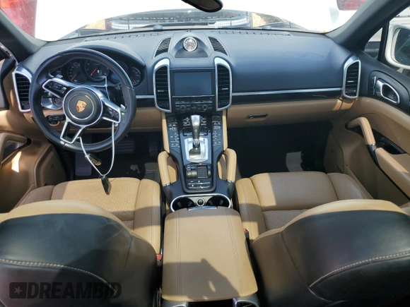 2016 Porsche Cayenne z VIN WP1AA2A26GLA09807, wystawiony jako Copart lot #59619335 z przebiegiem 102 327 mil mil oraz Szkoda całkowita • Salvage title. Historia ofert i sprzedaży dostępna na DreamBid. Obrazek 8.