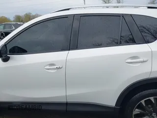 2016 Mazda CX-5 Grand Touring with VIN JM3KE4DY3G0838204, listed as a IAAI auction lot 41961049 with 98,918 mi miles and . Bid and sale history available at carsss.com. Image 14.