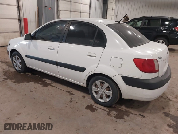 2009 Kia Rio SX with VIN KNADE223896533839, listed as a IAAI auction lot 41328220 with 140,968 mi miles. Bid and sale history available at carsss.com. Image 3.