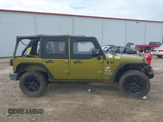 2007 Jeep Wrangler Unlimited X with VIN 1J4GA39177L164566, listed as a IAAI auction lot 42588655 with 50,915 mi miles and . Bid and sale history available at DreamBid. Image 13.