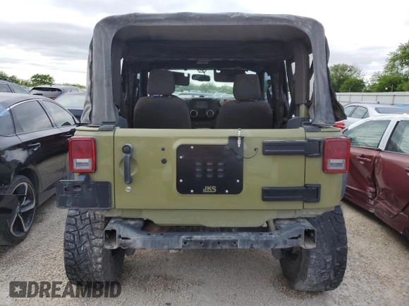 2013 Jeep Wrangler Rubicon z VIN 1C4HJWCG1DL574039, wystawiony jako Copart lot #48728645 z przebiegiem 116 537 mil mil oraz Szkoda całkowita • Salvage title. Historia ofert i sprzedaży dostępna na DreamBid. Obrazek 6.