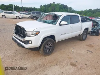2017 Toyota Tacoma SR5 z VIN 5TFAZ5CN9HX040563, wystawiony jako IAAI lot #42274119 z przebiegiem 244 422 mil mil oraz . Historia ofert i sprzedaży dostępna na DreamBid. Obrazek 2.