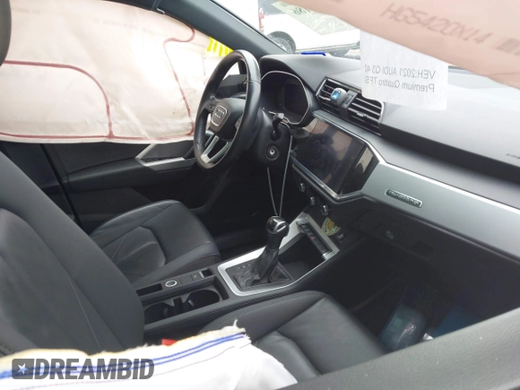2021 Audi Q3 Premium with VIN WA1AUCF35M1089733, listed as a IAAI auction lot 41506186 with 69,211 mi miles and . Bid and sale history available at DreamBid. Image 5.