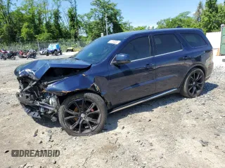 2018 Dodge Durango SXT with VIN 1C4RDJAG4JC161335, listed as a Copart auction lot 57243095 with 74,690 mi miles and Salvage title. Bid and sale history available at DreamBid. Image 1.