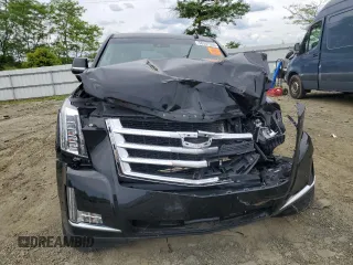 2019 Cadillac Escalade Luxury z VIN 1GYS4BKJ5KR283437, wystawiony jako Copart lot #58307535 z przebiegiem Nie podano mil oraz Czysty tytuł • Clean title. Historia ofert i sprzedaży dostępna na DreamBid. Obrazek 5.