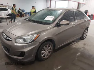 2013 Hyundai Accent GLS with VIN KMHCT4AE2DU486097, listed as a IAAI auction lot 41972806 with 295,949 mi miles. Bid and sale history available at carsss.com. Image 2.