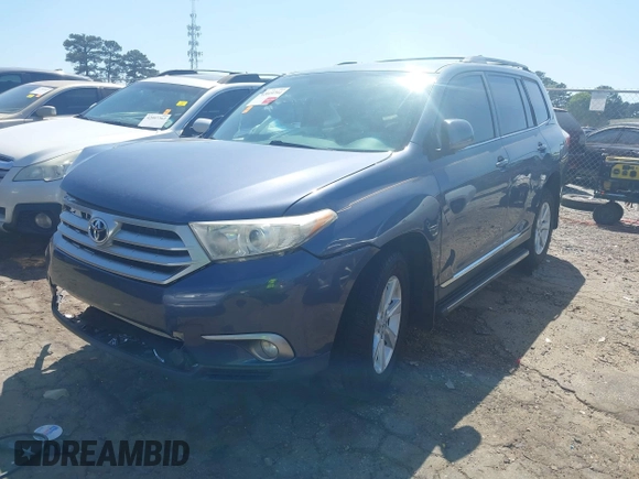 2013 Toyota Highlander with VIN 5TDZA3EH7DS044603, listed as a IAAI auction lot 42019794 with 220,483 mi miles and . Bid and sale history available at DreamBid. Image 2.