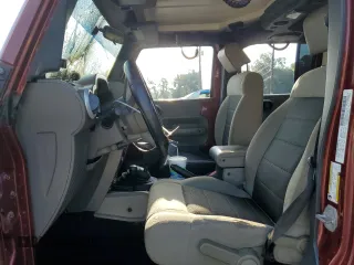 2010 Jeep Wrangler Unlimited Sahara with VIN 1J4BA5H13AL141851, listed as a Copart auction lot 63486504 with 0 mi miles and Salvage Title. Bid and sale history available at carsss.com. Image 7.
