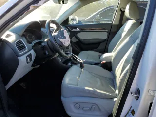 2015 Audi Q3 Premium Plus with VIN WA1BFCFS7FR014199, listed as a Copart auction lot 81987154 with 62,071 mi miles and Salvage title. Bid and sale history available at DreamBid. Image 7.