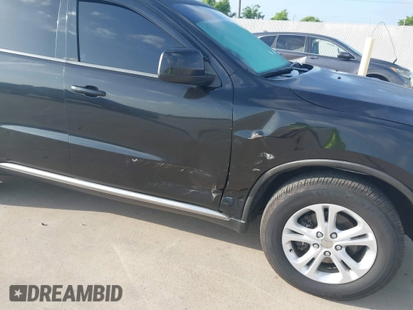 2012 Dodge Durango SXT with VIN 1C4RDJAG7CC293167, listed as a IAAI auction lot 42446634 with 140,182 mi miles and . Bid and sale history available at DreamBid. Image 6.