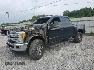 2017 Ford F-250 Lariat z VIN 1FT7W2BT0HEF35392, wystawiony jako Copart lot #57116725 z przebiegiem 143 819 mil mil oraz Szkoda całkowita • Salvage title. Historia ofert i sprzedaży dostępna na DreamBid. Obrazek 1.