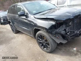 2018 Jeep Grand Cherokee Laredo E with VIN 1C4RJFAG2JC280670, listed as a IAAI auction lot 41686231 with 84,511 mi miles. Bid and sale history available at carsss.com. Image 1.