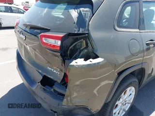 2015 Jeep Cherokee Sport with VIN 1C4PJMAB9FW595102, listed as a IAAI auction lot 42257918 with 95,059 mi miles and . Bid and sale history available at DreamBid. Image 6.