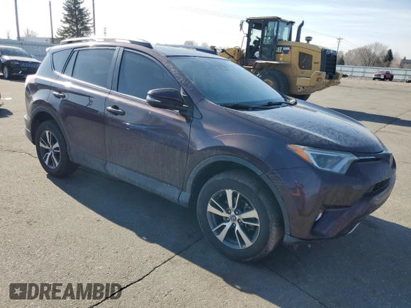2018 Toyota RAV4 XLE with VIN 2T3WFREVXJW461897, listed as a Copart auction lot 48459355 with 159,479 mi miles and Salvage Title. Bid and sale history available at DreamBid. Image 4.