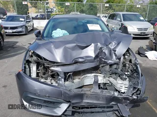 2018 Honda Civic LX with VIN 2HGFC2F58JH514161, listed as a IAAI auction lot 42073133 with 117,658 mi miles. Bid and sale history available at carsss.com. Image 6.