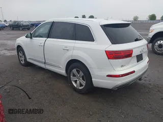 2018 Audi Q7 Premium Plus with VIN WA1LHAF70JD015988, listed as a IAAI auction lot 42213019 with 156,124 mi miles and . Bid and sale history available at DreamBid. Image 3.