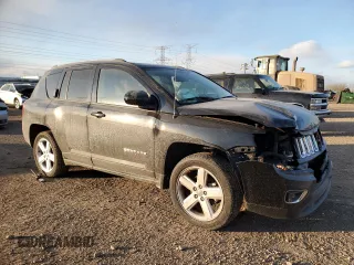 2014 Jeep Compass High Altitude with VIN 1C4NJCEAXED680799, listed as a Copart auction lot 89081285 with 63,447 mi miles and Salvage Title. Bid and sale history available at carsss.com. Image 4.