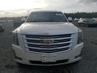 2015 Cadillac Escalade Platinum z VIN 1GYS4PKJ5FR574930, wystawiony jako Copart lot #74691204 z przebiegiem Nie podano mil oraz Szkoda całkowita • Salvage title. Historia ofert i sprzedaży dostępna na DreamBid. Obrazek 5.