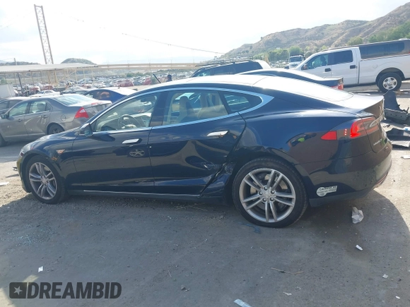 2013 Tesla Model S with VIN 5YJSA1CN8DFP07177, listed as a IAAI auction lot 42127797 with 75,227 mi miles and . Bid and sale history available at DreamBid. Image 15.