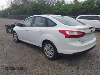 2012 Ford Focus SE with VIN 1FAHP3F21CL201889, listed as a IAAI auction lot 42070260 with 126,650 mi miles. Bid and sale history available at carsss.com. Image 3.