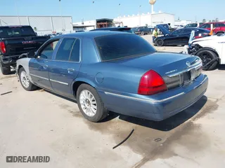 2009 Mercury Grand Marquis LS with VIN 2MEHM75V09X634393, listed as a IAAI auction lot 41993456 with 153,862 mi miles. Bid and sale history available at carsss.com. Image 3.